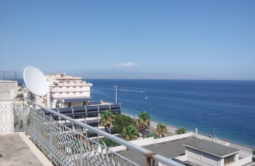 Santa Teresa di Riva Apartment | Exclusive Penthouse Suite with Ocean View Near Taormina