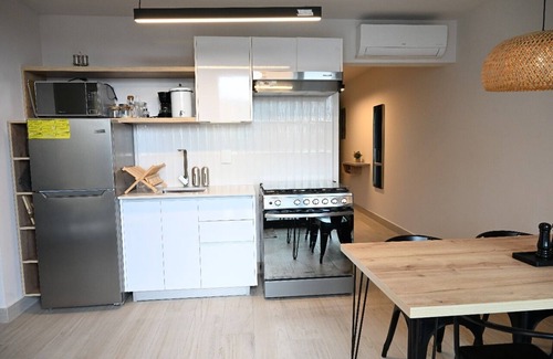 Santa Ana Apartment | Penthouse looking 1BDApt centric location perfect for couples or solo traveling