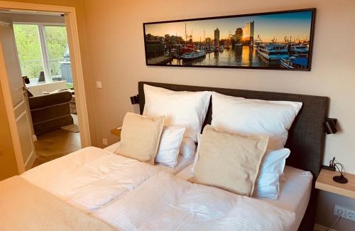 Ascheberg Apartment | Elegant Penthouse Suite by Plöner See with Ocean View