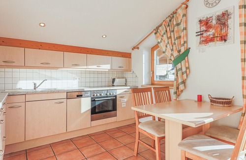 Brixen im Thale Apartment | Stylish Penthouse with Balcony and Scenic Views