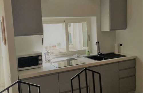 Cagliari Apartment | Elegant Penthouse with Panoramic Terrace and Ocean Views