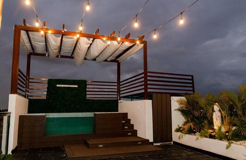 Prado Oriental Apartment | Deluxe Penthouse Retreat with Private Jacuzzi and High-Speed WiFi