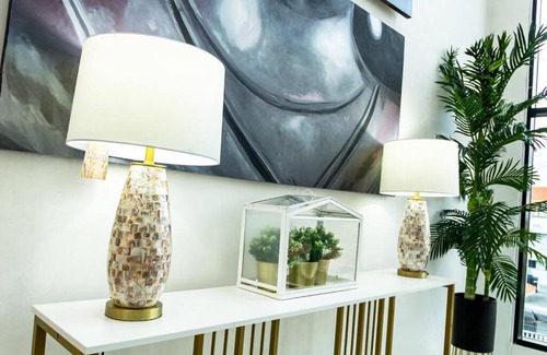 Prado Oriental Apartment | Deluxe Penthouse Retreat with Private Jacuzzi and High-Speed WiFi