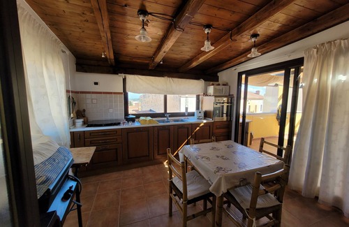 La Maddalena Apartment | Elegant Penthouse with Terrace, Steps from Palau Center