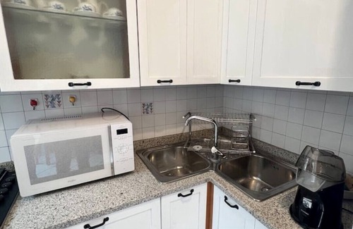 Tuscolano Apartment | Stylish Penthouse with Terrace in Central Metro Area