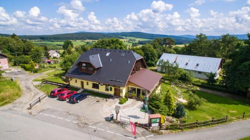 Nove Hute House | Discover Comfort at Penzion U Zpěváků with Pool & Dining