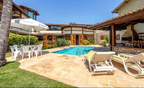 Centro Comercial House | Discover Pereque Beach House: Oceanfront Paradise Awaits