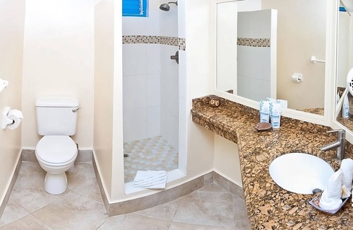 St. Lawrence Gap Hotel | Beachfront Escape in Barbados: Pool, Kitchenette & Balcony