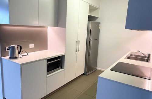 South Townsville Apartment | Ideal Spot for Families and Couples: Pool & Breakfast Included