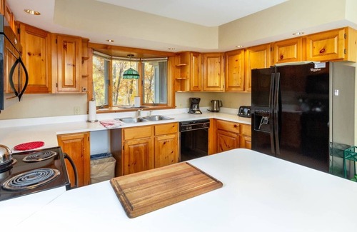 North Troy House | Prime Location: Ski-In/Ski-Out Access on Village Chair