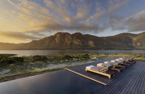 Stanford Villa | Discover Perivoli Lagoon House: Ocean View & Poolside Bliss