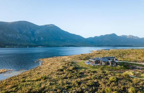 Stanford Villa | Discover Perivoli Lagoon House: Ocean View & Poolside Bliss