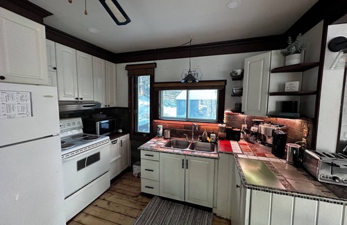 Brownsburg-Chatham Ski Chalet | Pet-Friendly, Secluded Waterfront Cottage with Modern Amenities & Cozy Fireplace