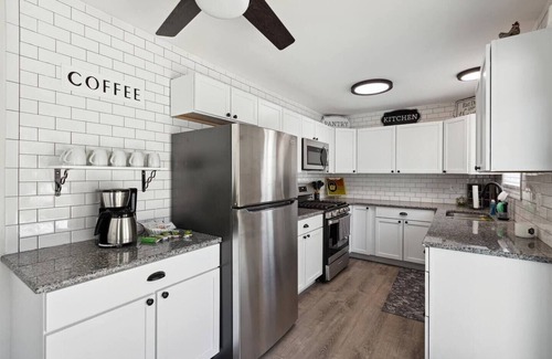 Bay City House | Perfect for Groups: Pet-Friendly with Year-Round Hot Tub