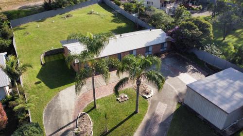 Surf Beach House | Pet-Friendly Private Retreat with Expansive Backyard Oasis