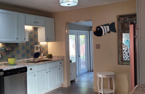 Edgewater House | Pet-Friendly Riverwalk Cottage with Pool Access & Spa