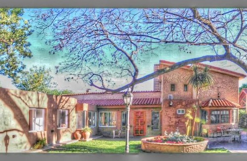 Funes Hotel | Charming Petit Hotel El Alcanfor: Pet-Friendly Retreat