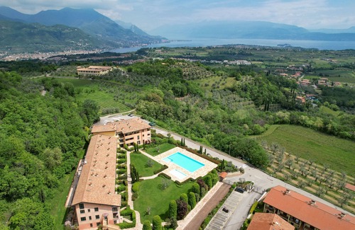 Puegnago del Garda Apartment | Cozy Lodging at Petit Nid du Lac with Lake Views & Pool