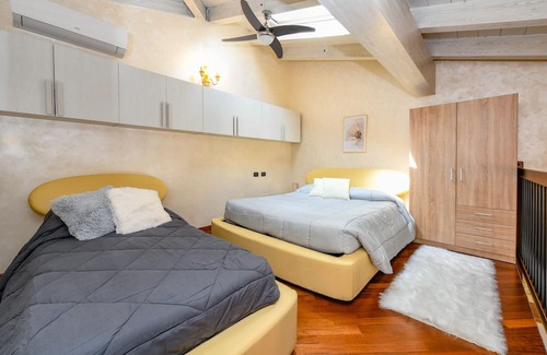 Puegnago del Garda Apartment | Cozy Lodging at Petit Nid du Lac with Lake Views & Pool