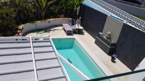 Puerto de la Duquesa Villa | Experience Petit Paradis: 4-Star Oceanfront Retreat