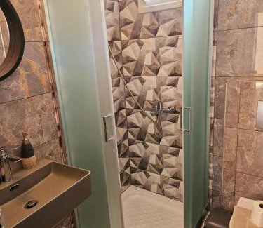 Sarti Apartment | Oceanfront Escape at Petros House: Guest Rated 9.8/10