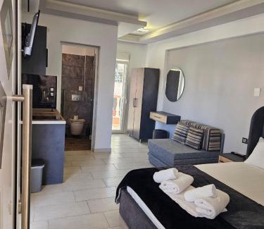 Sarti Apartment | Oceanfront Escape at Petros House: Guest Rated 9.8/10