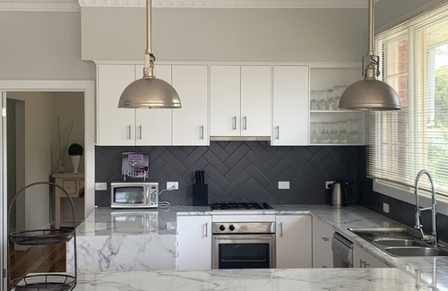 Tocumwal House | Experience Peyton's Place: Five Bedroom Villa with Spa & Pool