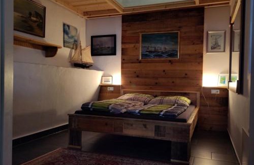 Neumuhlen-Dietrichsdorf Apartment | Pferdestall: Oceanfront 4-Star Retreat with Family-Friendly Perks