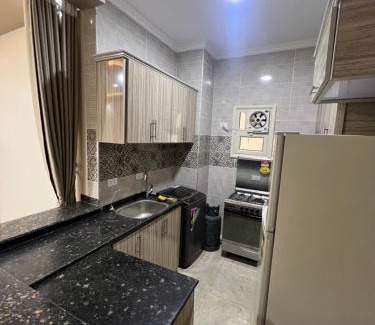 Al-Burulus Apartment | Relax at Pharma Beach Resort: Family-Friendly Getaway