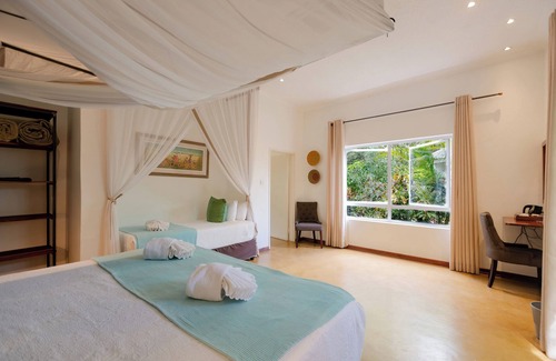 Victoria Falls Cabin | Exceptional PheZulu Guest Lodge: Top-Rated with Pool & Dining
