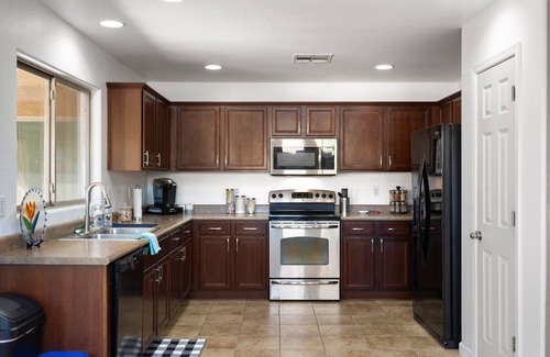 Laveen Village House | Prime Phoenix Location: 4-Bedroom Retreat for Families