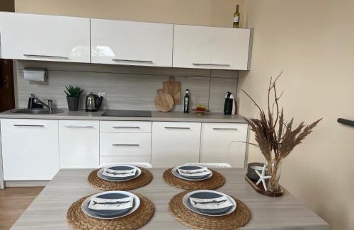 Karwia Apartment | Explore Piaski Bałtyku: Ocean View and Private Beach Access