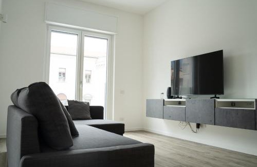 Lecco Apartment | Discover Piazza XX Settembre: Heart of the City Experience
