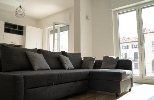 Lecco Apartment | Discover Piazza XX Settembre: Heart of the City Experience
