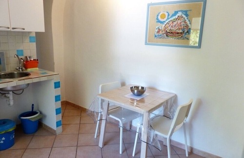 Santa Teresa di Gallura Apartment | Cozy Flat with Balcony Overlooking the Garden & Ocean View