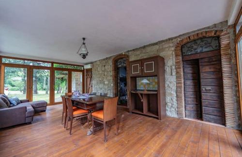 Capolona Villa | Whimsical Piccolo Ulivo Ranch Villa with Scenic Pool Access