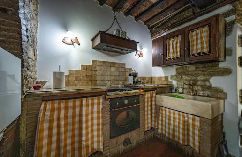 Capolona Villa | Whimsical Piccolo Ulivo Ranch Villa with Scenic Pool Access