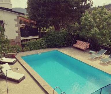 Manzanares el Real Apartment | Pet-Friendly Piedra Libre Apartamentos with Pool Access