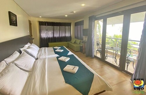 Bauan Hotel | Discover Pier Uno Dive Resort with Pool and Breakfast Options