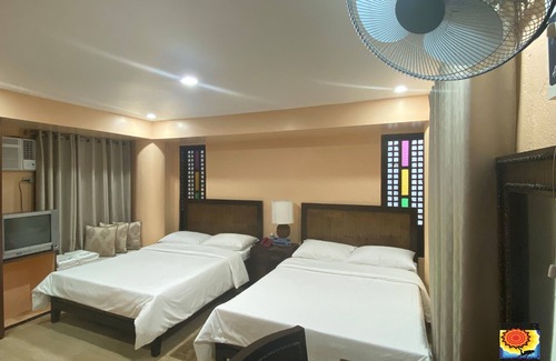 Bauan Hotel | Discover Pier Uno Dive Resort with Pool and Breakfast Options