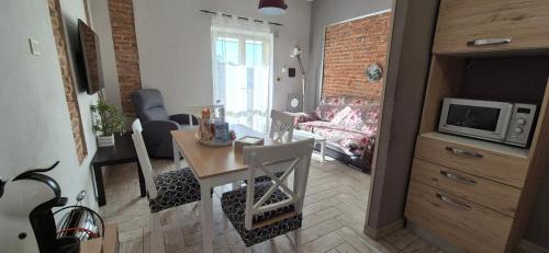 Carbonia Apartment | Relax at Piero's Apartment with Oceanfront Pool Access