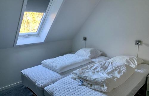 Læsø Apartment | Experience Pilegården Ferieboliger with Oceanfront Views