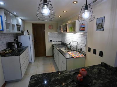 10 de Diciembre Apartment | Pet-Friendly Pinar Suites: Guest Rated 10/10 Stay Awaits!