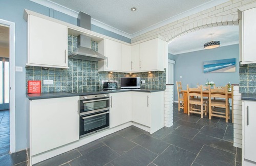 Wiseman's Bridge House | Family-Friendly Pine Lodge in Pembrokeshire, Sleeps 12