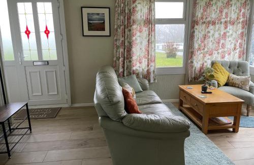 Haverfordwest Ski Chalet | Discover Pine Tree: Family-Friendly Retreat with High Ratings