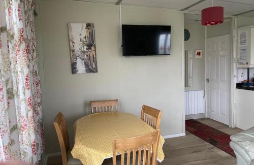 Haverfordwest Ski Chalet | Discover Pine Tree: Family-Friendly Retreat with High Ratings