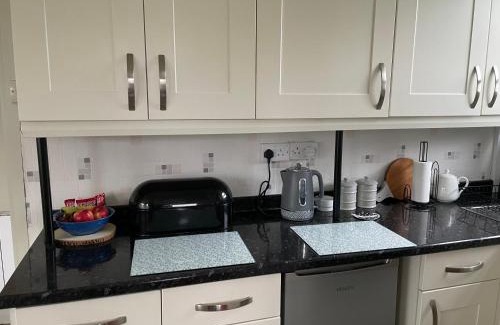 Haverfordwest Ski Chalet | Discover Pine Tree: Family-Friendly Retreat with High Ratings