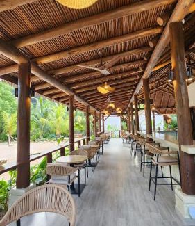 Mahe Island Apartment | Pineapple Beach Villas: Oceanfront Retreat with Pool