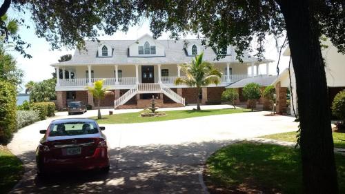 Tropic Villa | Experience Pineda Palms Estate with Oceanfront Views