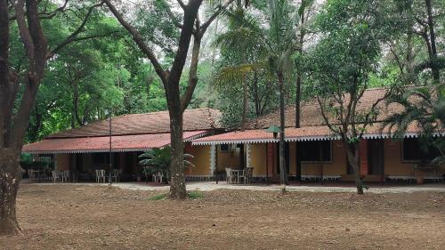 Karjat Hotel | Relax at Pinewood Resort: Family-Friendly with Pool Access